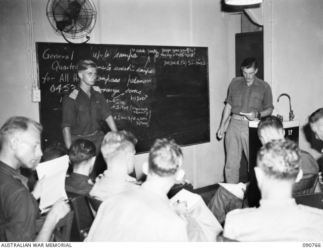 Captain C.S. Morrison Conducting Classes in Malay For Headquarters 1 Corps Officers